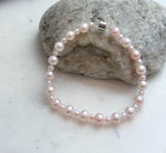 Genuine pale pink pearl bracelet with graduated 3.5–6.5mm freshwater pearls and S925 sterling silver.