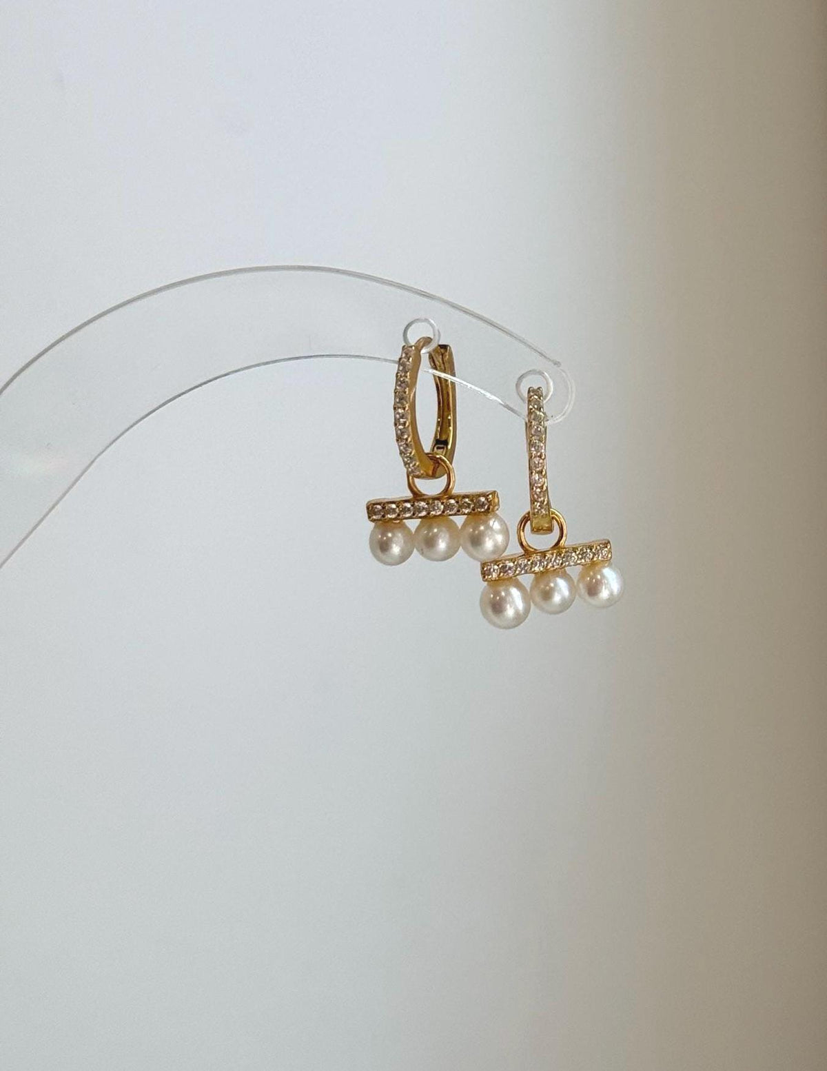Elegant sterling silver pearl hoops for everyday wear.