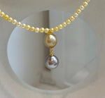 Golden freshwater pearl necklace paired with Tahitian and South Sea golden pearl pendant.