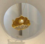 Genuine South Sea saltwater pearl shell brooch featuring a 10.5mm ultra golden pearl.