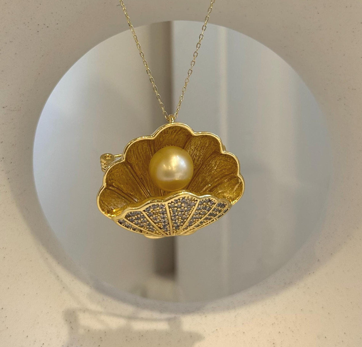 Natural ultra golden South Sea pearl with exceptional mirror-like shine.