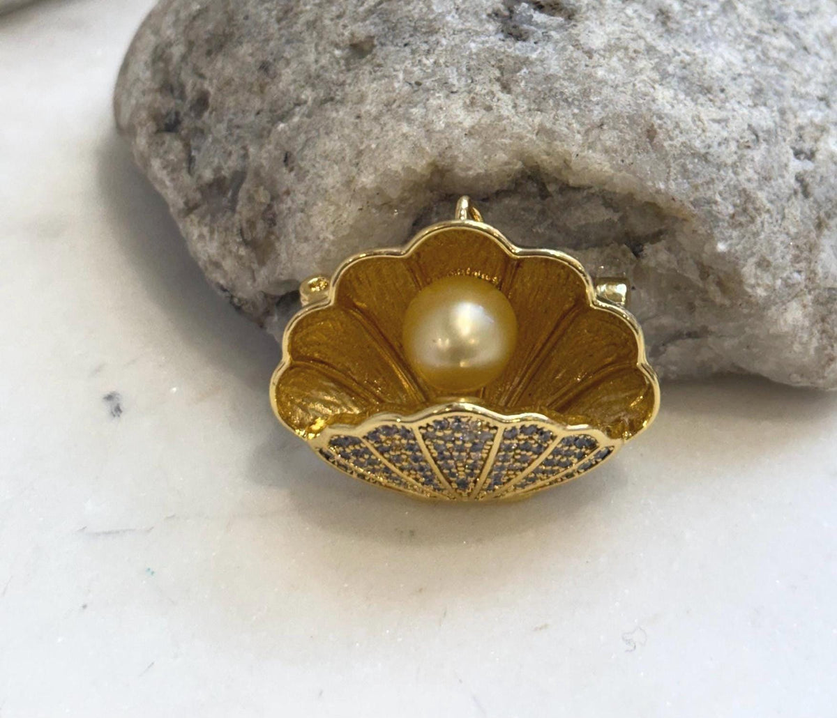 Handcrafted shell brooch pendant presented in an elegant gift box.
