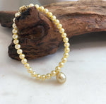 Genuine South Sea pearl bracelet featuring a rich deep tea golden pearl and high luster.