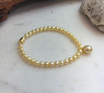 Genuine 9.1mm South Sea golden saltwater pearl bracelet in a rich deep tea gold color.