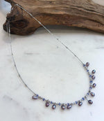 Handmade S925 sterling silver necklace with purple Keshi pearls and Tanzanite gemstone.