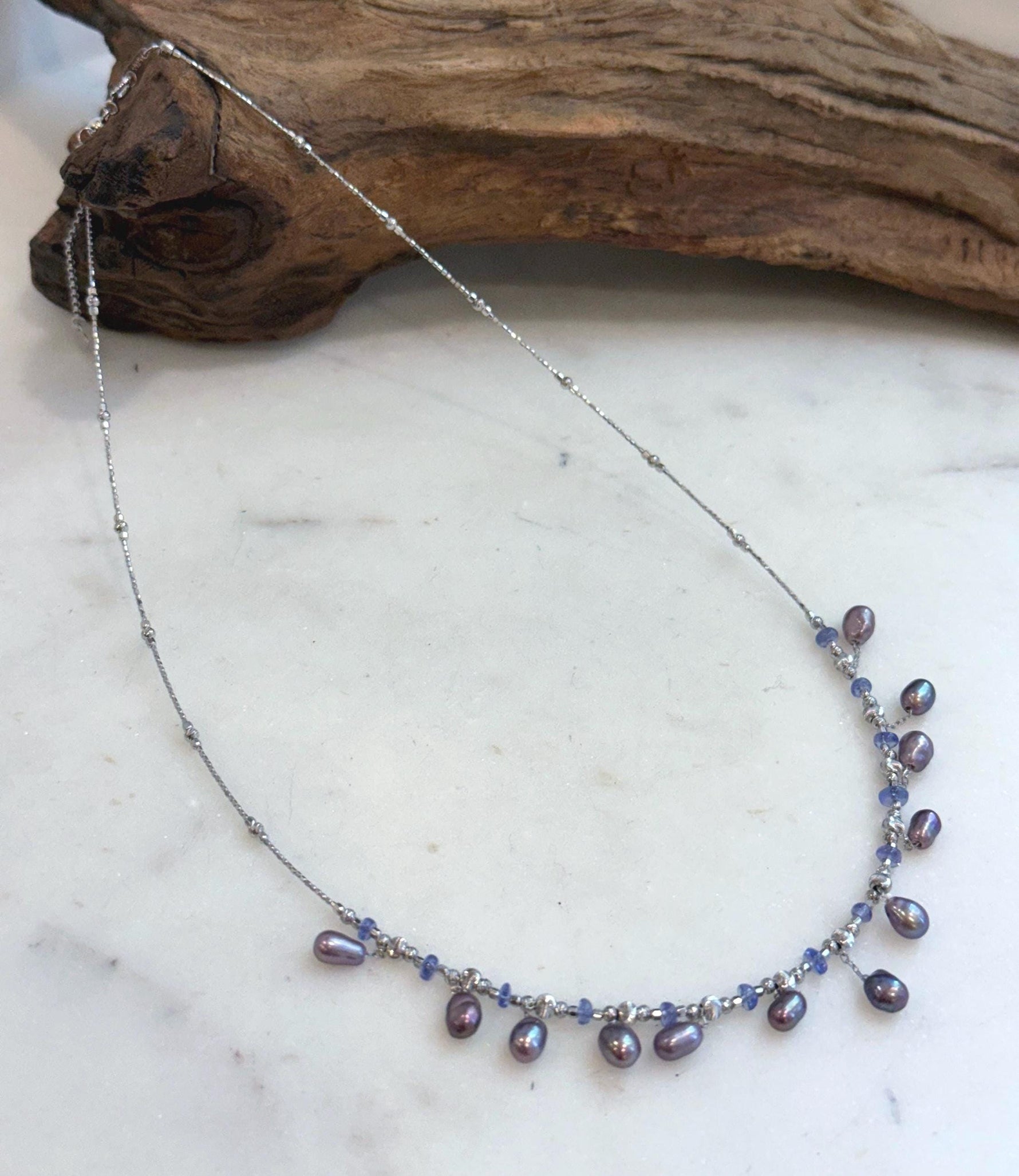 Handmade S925 sterling silver necklace with purple Keshi pearls and Tanzanite gemstone.