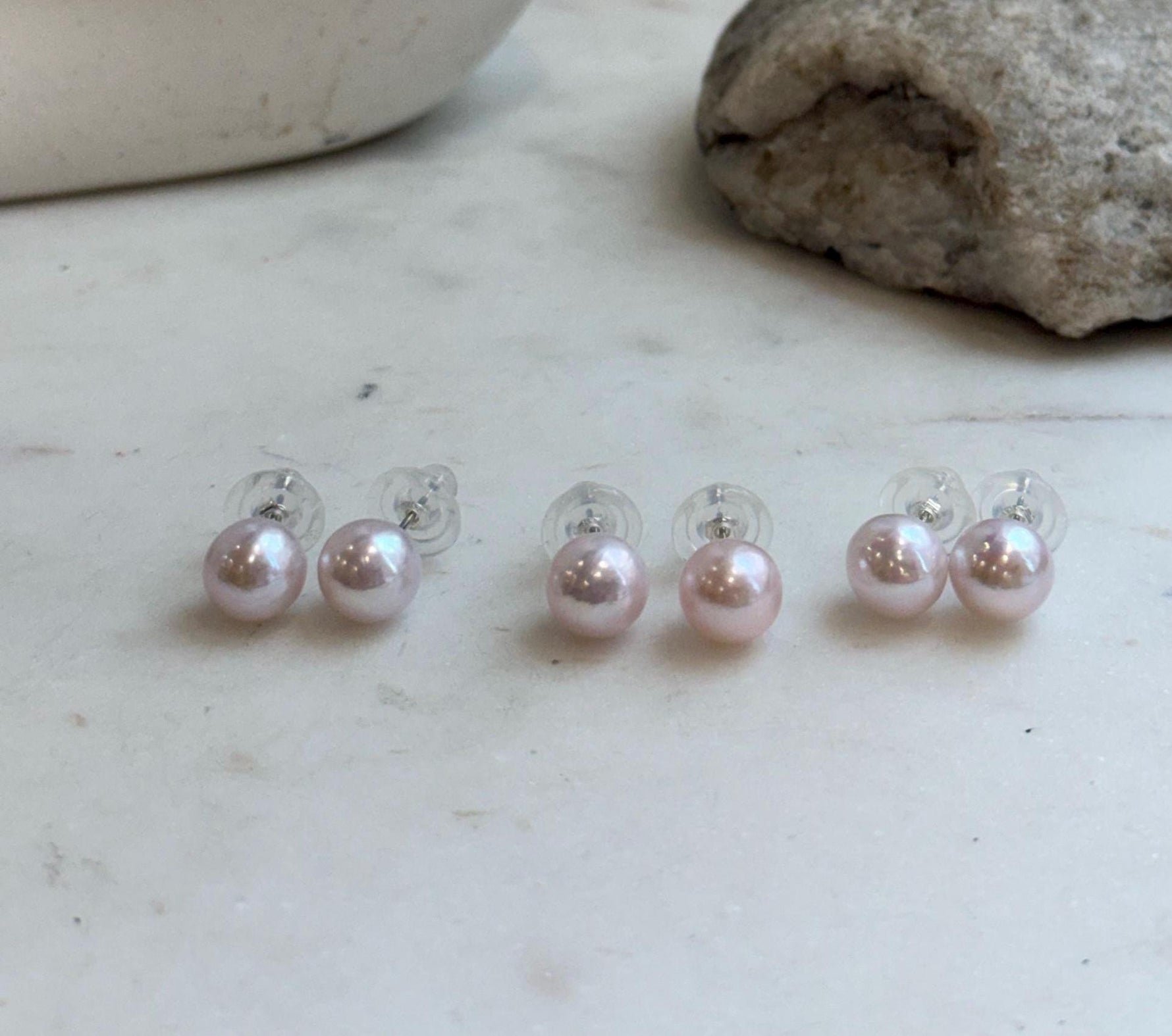 9.5mm Edison pale pink pearl stud earrings with beautiful mirror luster and S925 sterling silver settings.