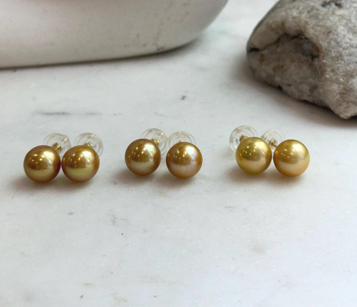 Elly’s 11.3mm Edison golden pearl stud earrings with beautiful mirror luster and S925 sterling silver settings.