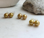 Large 11.3mm Edison pearl earrings with beautiful golden tones and bright mirror luster.