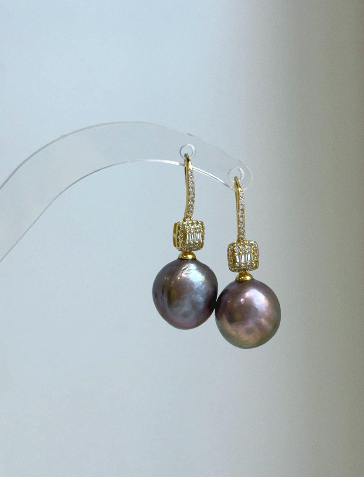 Large 13.2mm lavender Edison pearl drop earrings with elegant sterling silver hook design.