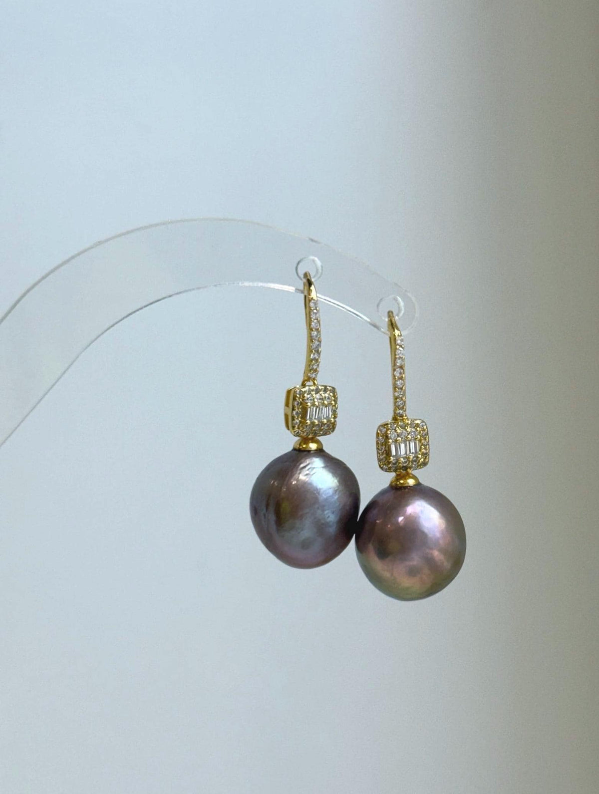 Elegant freshwater pearl hook earrings measuring approximately 3.3–3.5cm high.