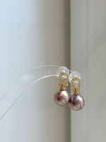Large 12.1mm rose gold Edison pearls with highly reflective mirror-like surfaces.