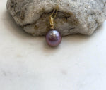 Minimalist lavender rose pearl pendant featuring a highly reflective mirror-like surface.
