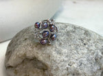 Adjustable S925 sterling silver ring featuring six purple Keshi pearls.
