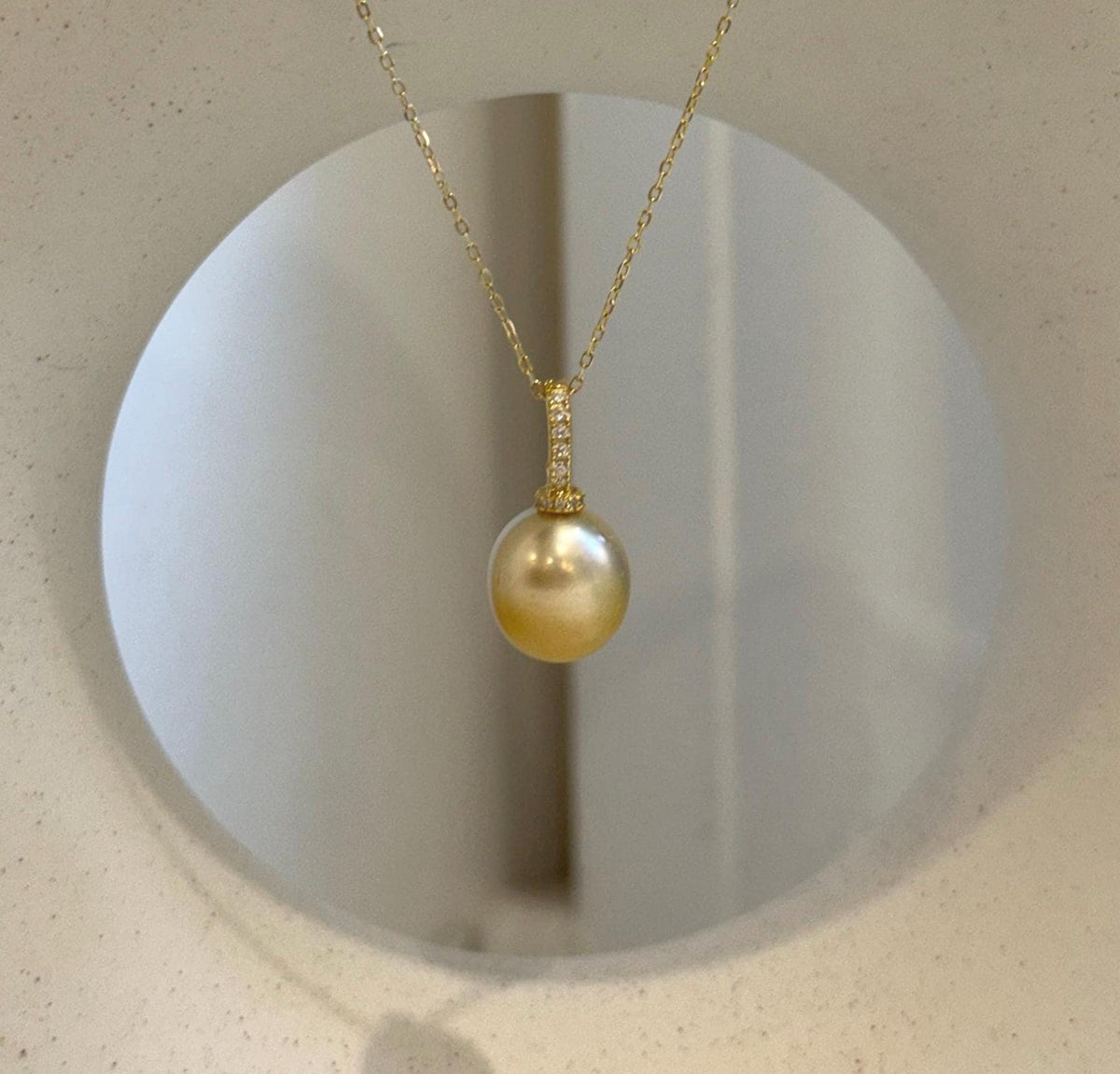 11. 2mm genuine South Sea golden pearl pendant with exceptional mirror luster.
