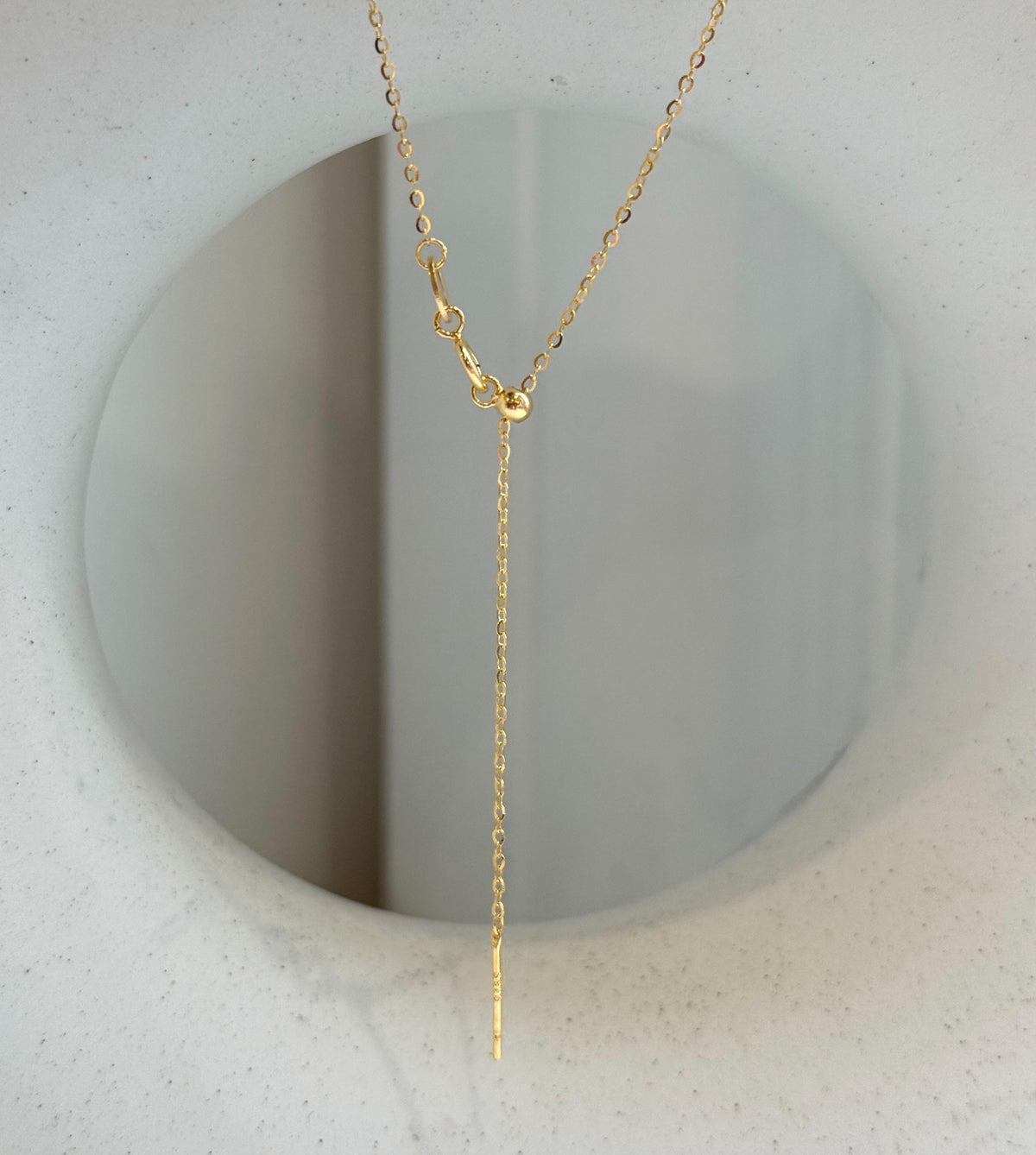Minimalist gold-plated sterling silver pearl pendant highlighting a premium golden pearl.