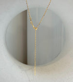 Minimalist gold-plated sterling silver pearl pendant highlighting a premium golden pearl.