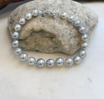 Classic 7.6-inch Akoya pearl bracelet showcasing natural white ocean pearls.