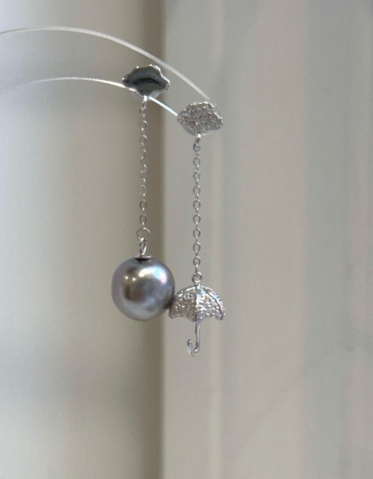 Close-up of 10.7mm platinum Tahitian pearls