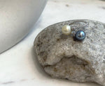 Handmade genuine saltwater pearl ring in adjustable sterling silver.