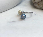 Close-up of mirror-luster South Sea Golden and Tahitian pearls on S925 ring.