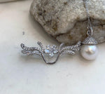 Mirror luster white Edison pearl set in an elegant vintage design