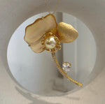 Close-up of 10mm deep tea golden South Sea pearl showing beautiful mirror-like luster.