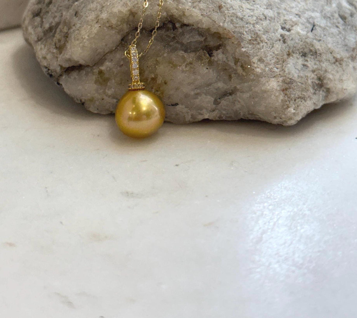 Deep tea golden pearl pendant with rich natural-looking color and high luster