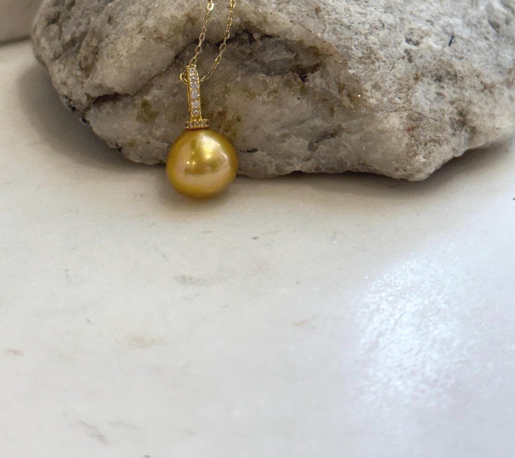 Deep tea golden pearl pendant with rich natural-looking color and high luster