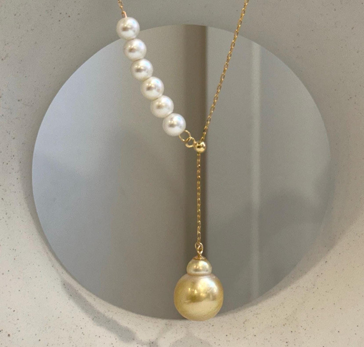 Elly’s South Sea golden and white freshwater pearl Y lariat necklace with 8 genuine pearls.