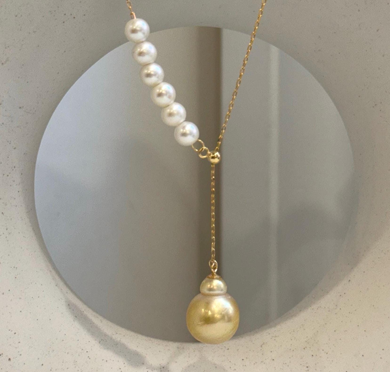 Elly’s South Sea golden and white freshwater pearl Y lariat necklace with 8 genuine pearls.