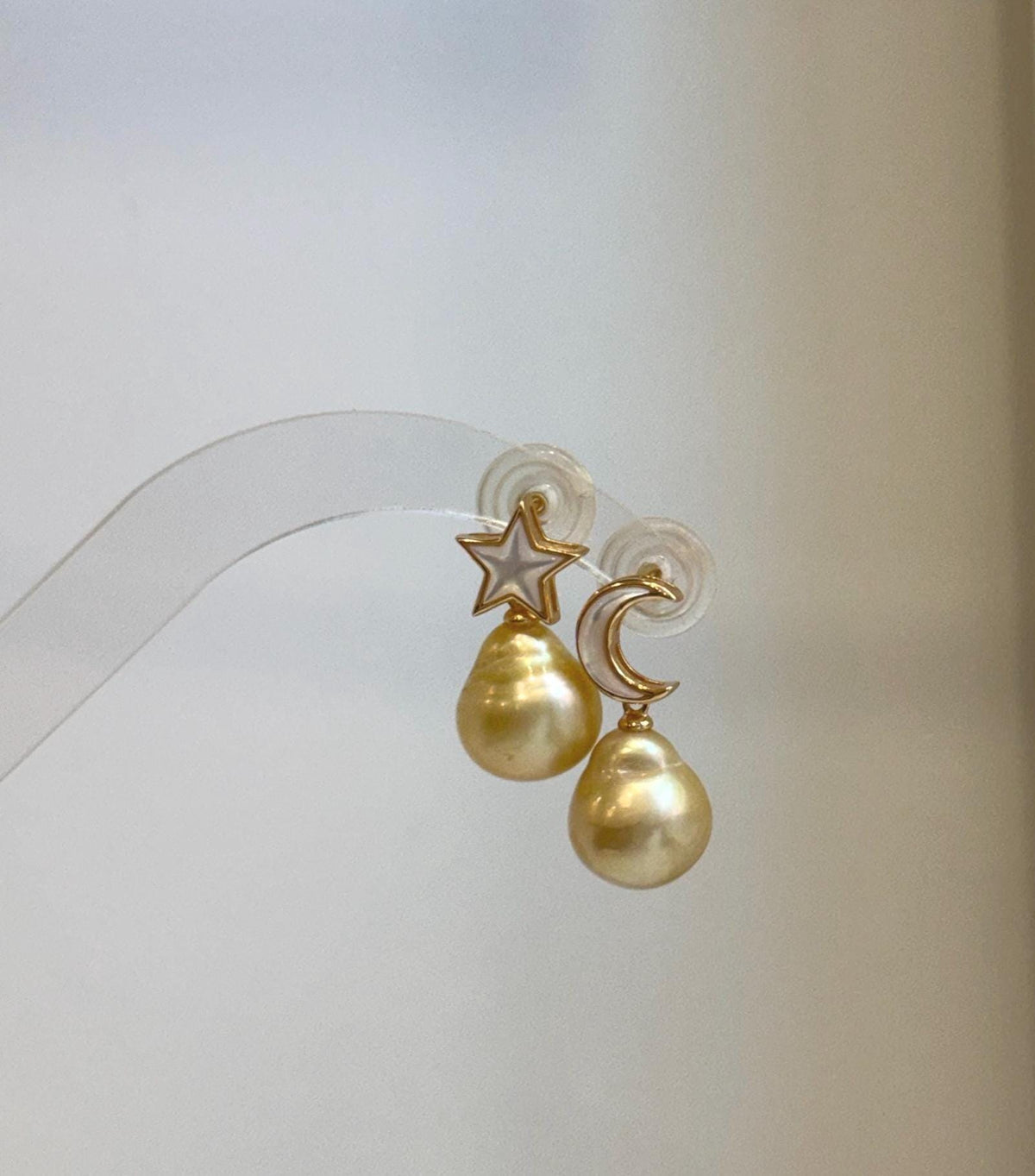 Luxury golden saltwater pearl earrings with brilliant mirror luster for everyday elegance.