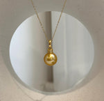 Genuine 11.4mm freshwater pearl pendant with beautiful mirror-like luster.