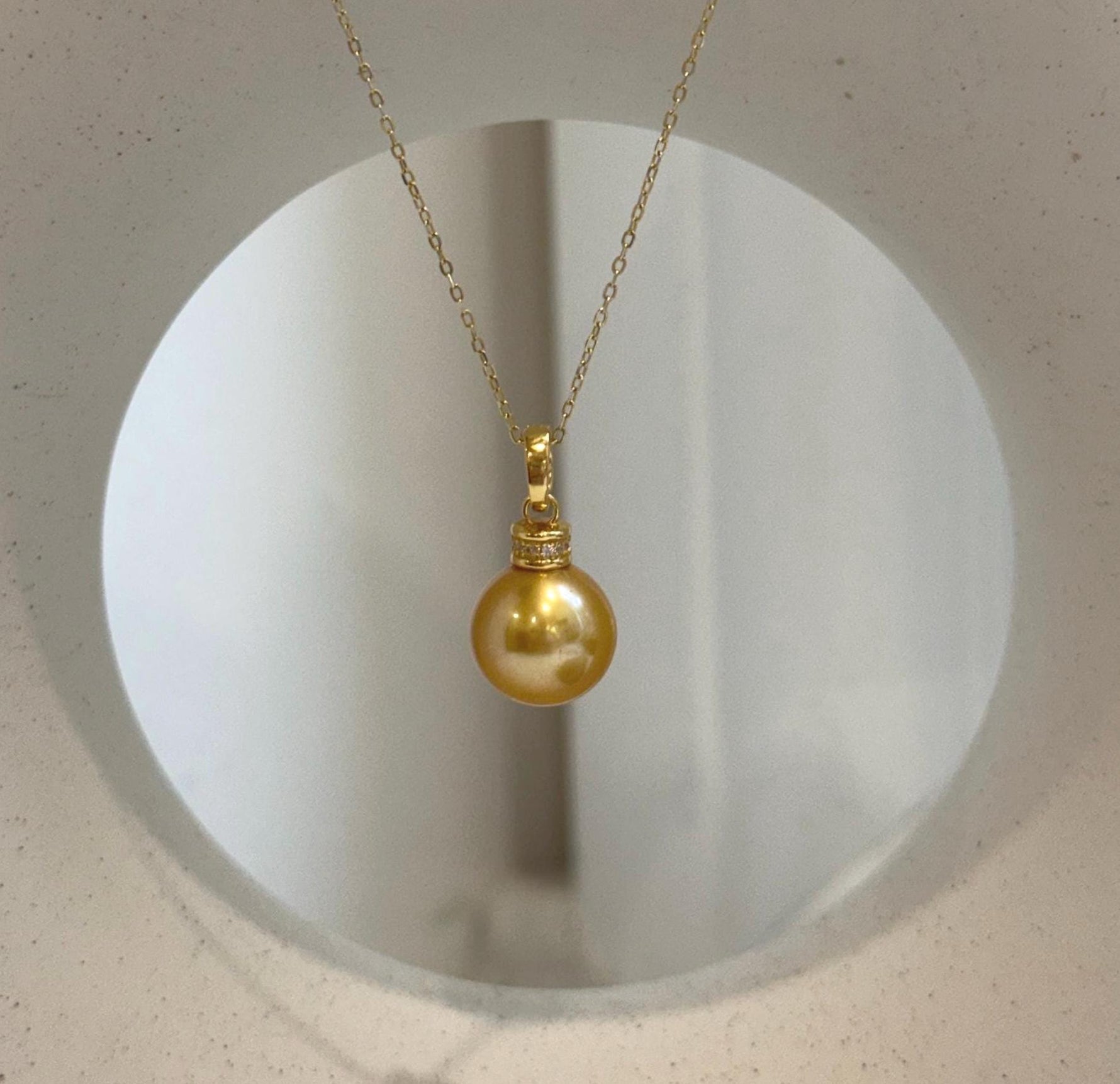 Genuine 11.4mm freshwater pearl pendant with beautiful mirror-like luster.