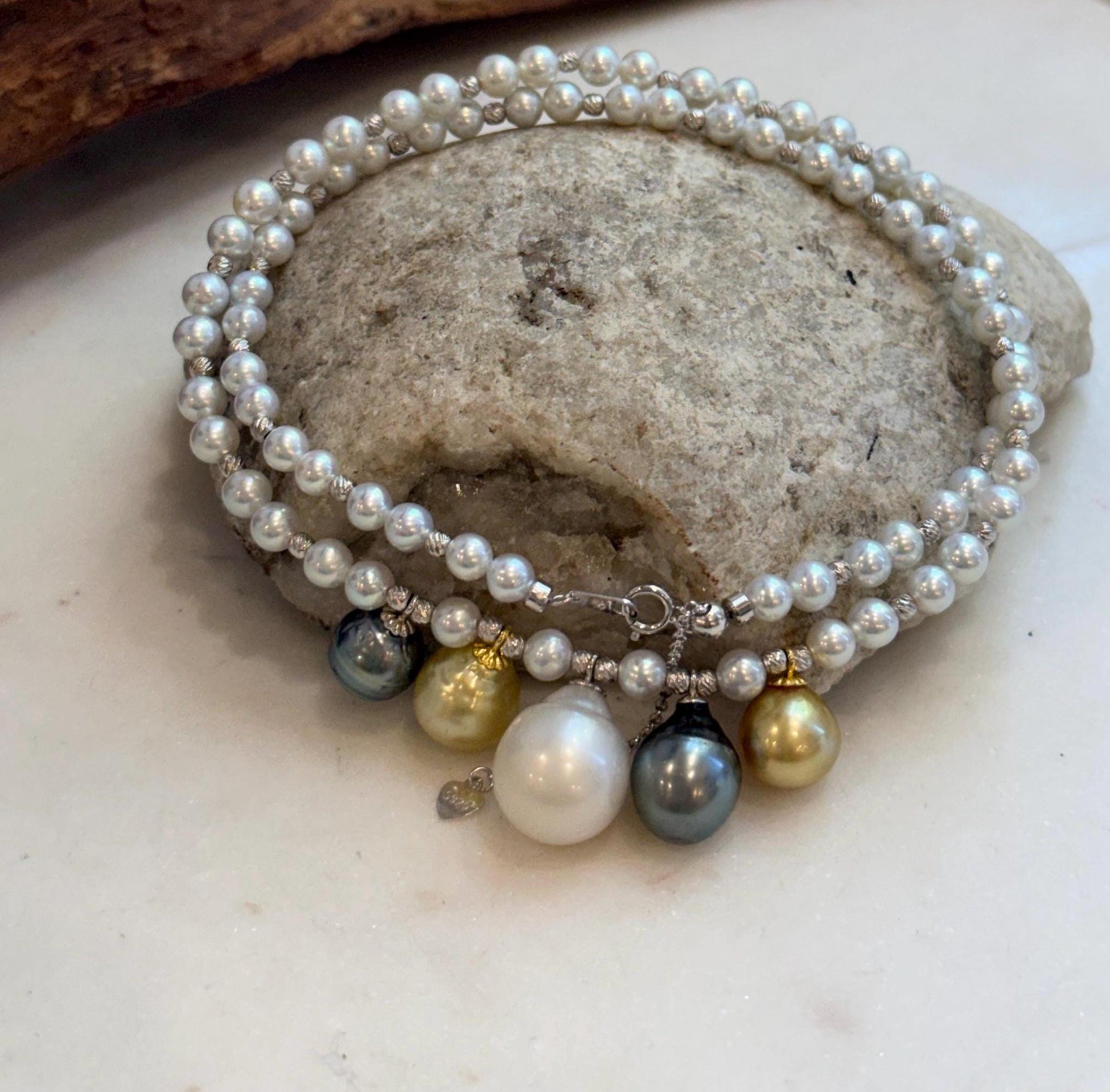 Fine jewelry necklace with natural saltwater pearls and silver clasp