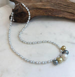 Luxury pearl gift featuring golden, white and Tahitian ocean pearls