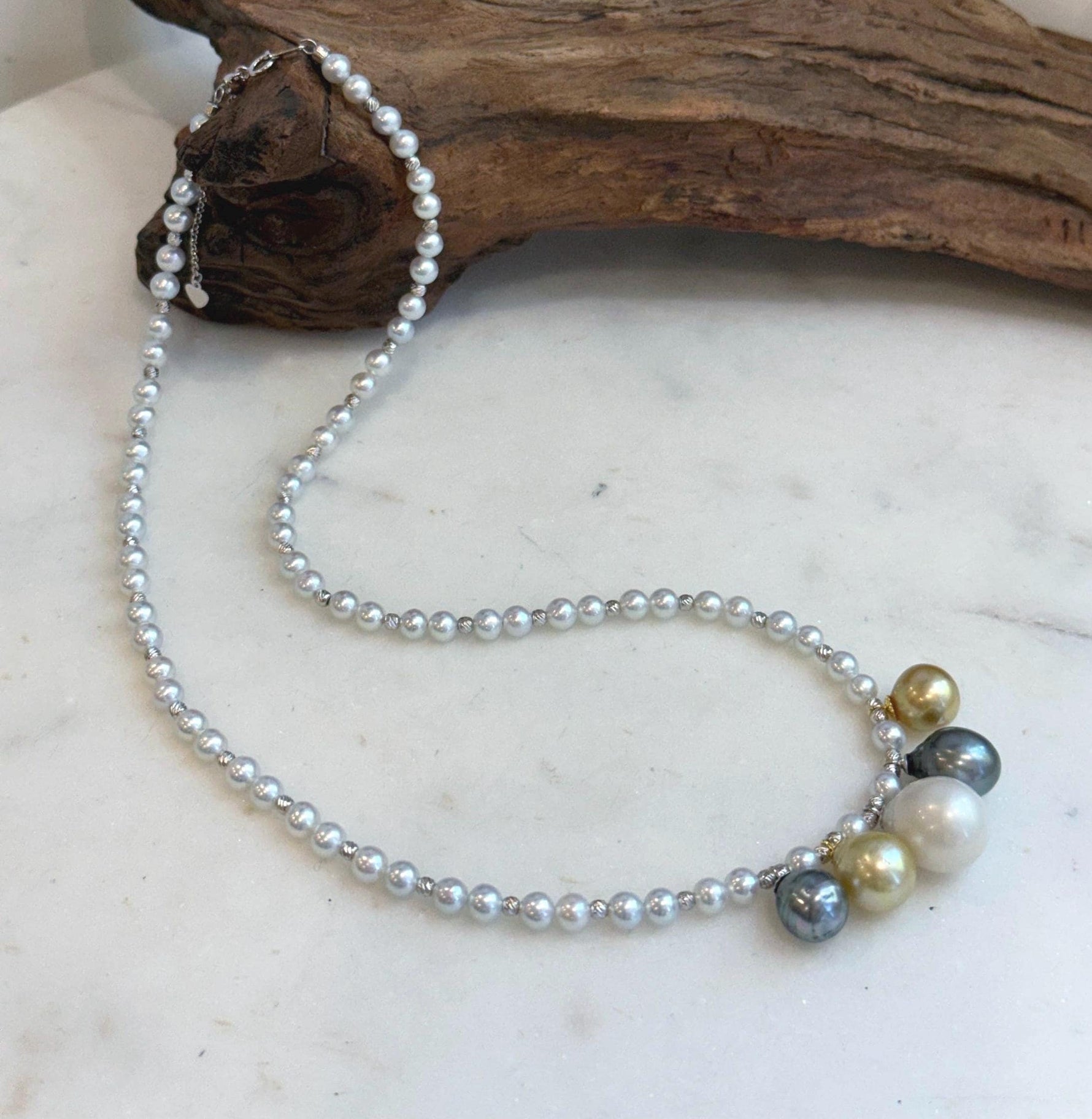 Luxury pearl gift featuring golden, white and Tahitian ocean pearls
