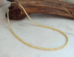 Elly’s 3.5–4mm golden freshwater pearl necklace with mirror luster