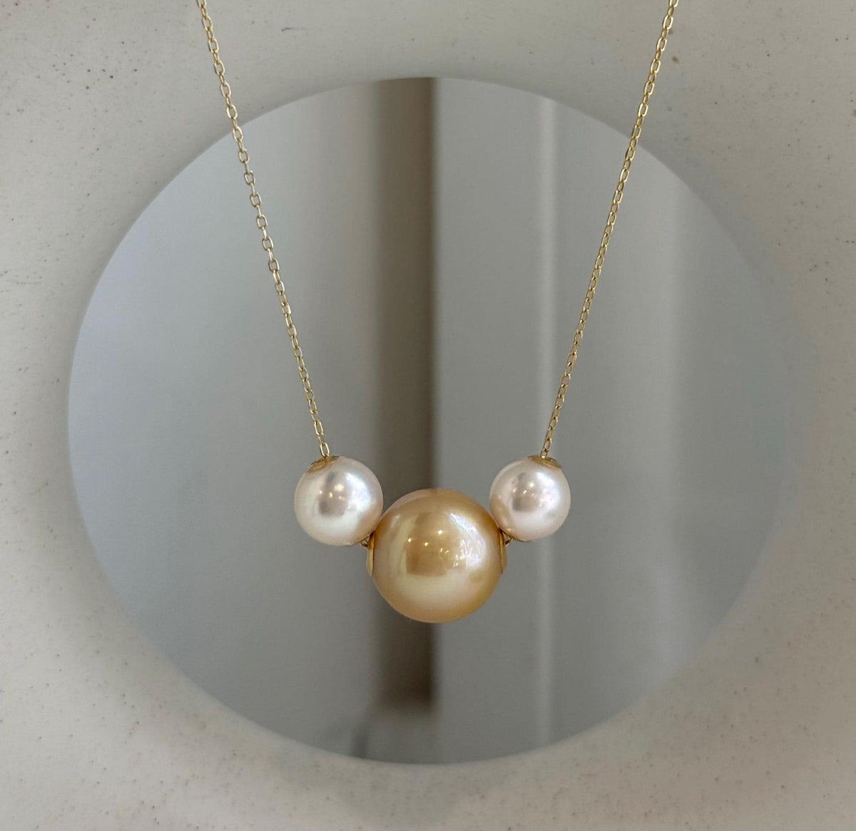 18K gold pearl floating pendant with three saltwater pearls