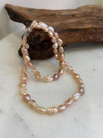 Elegant genuine freshwater Keshi pearl strand measuring approximately 19.7 inches long.