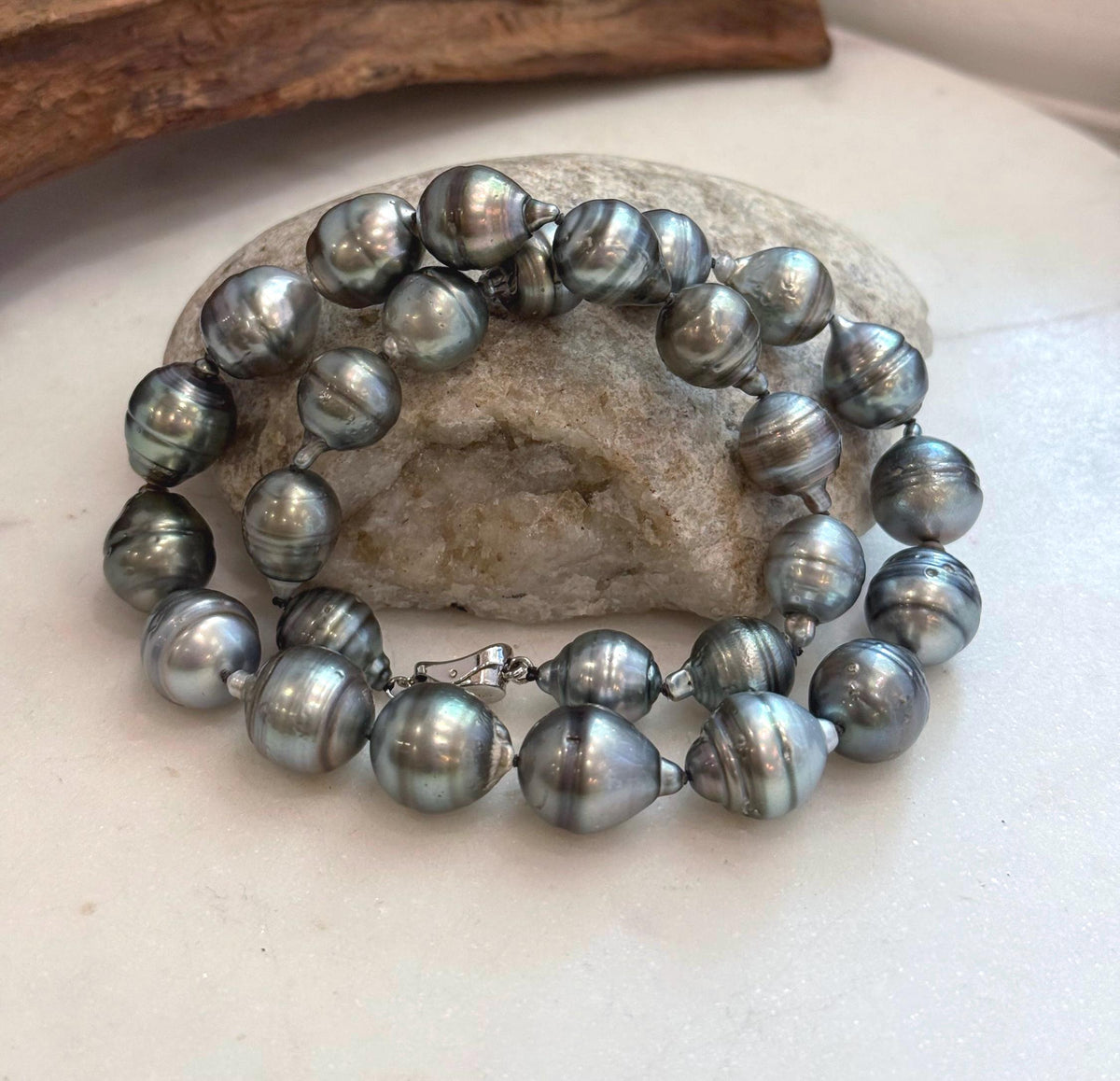 Genuine Tahitian black ocean pearl strand necklace in platinum tones