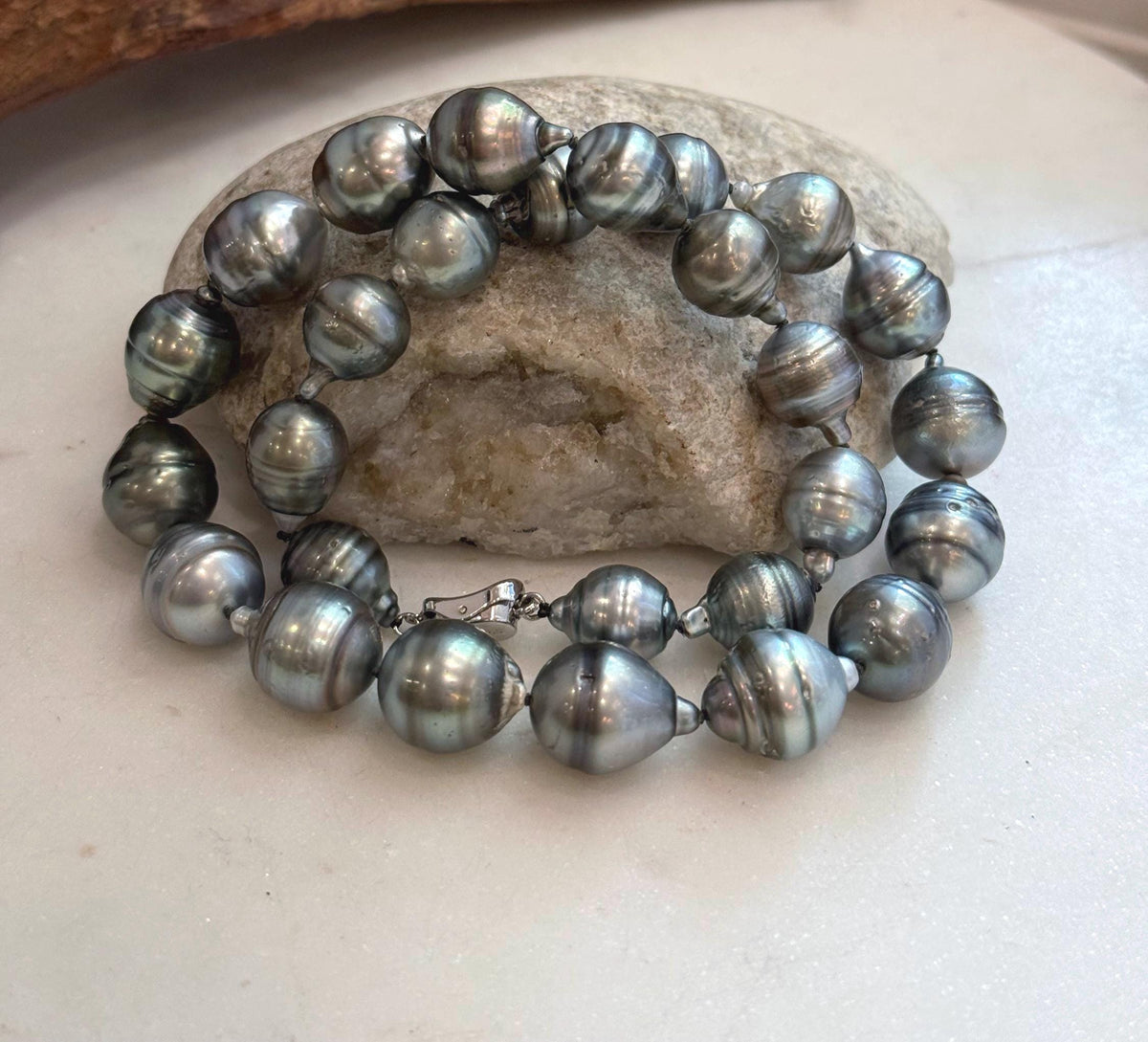 Luxury Tahitian platinum pearl necklace featuring 27 ocean pearls