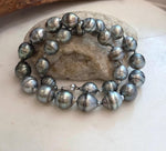 Luxury Tahitian platinum pearl necklace featuring 27 ocean pearls