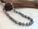 Large 11–13.5mm black Tahitian pearls with reflective mirror luster