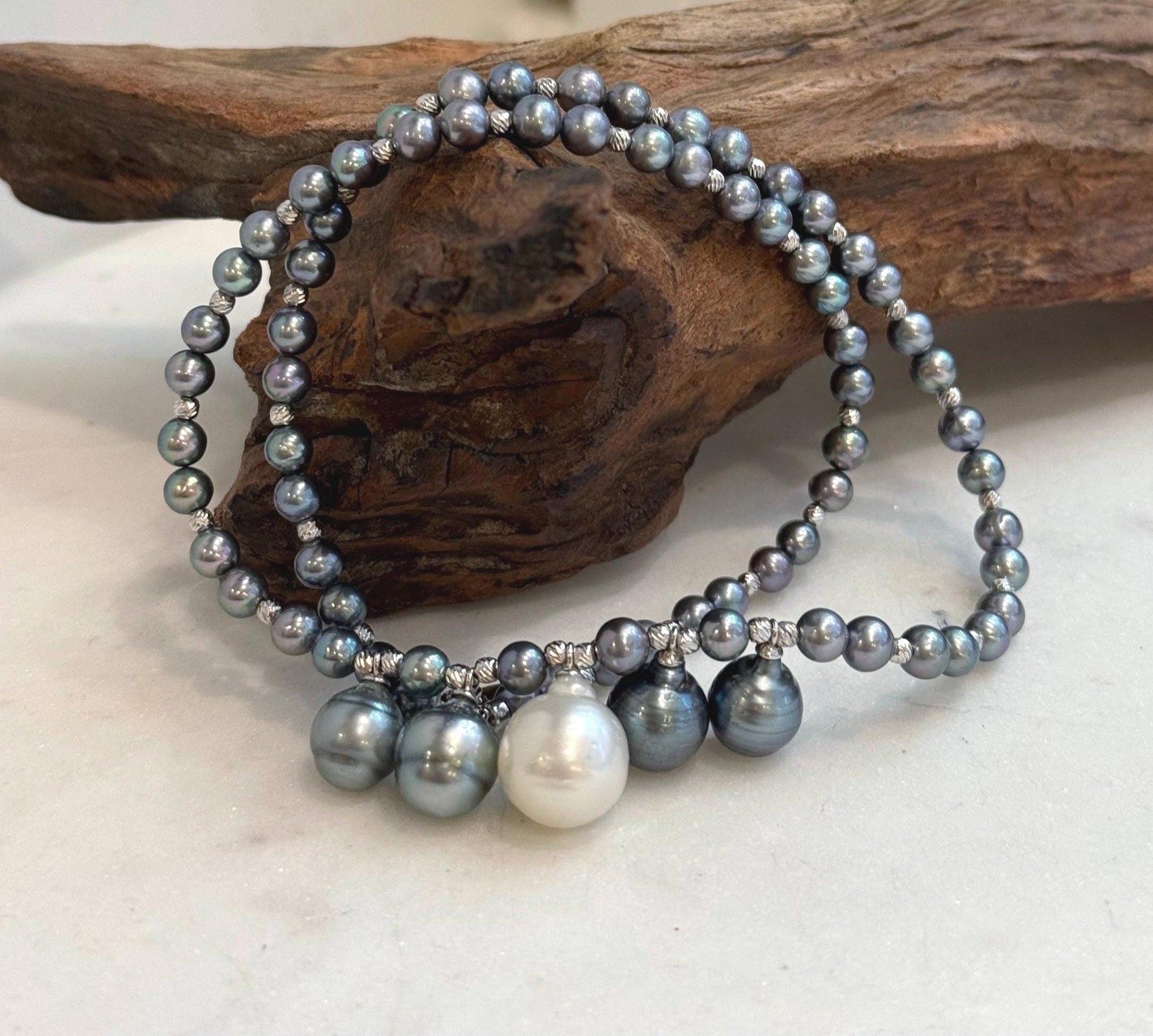 Elegant five pearl necklace with white and dark Tahitian pearls