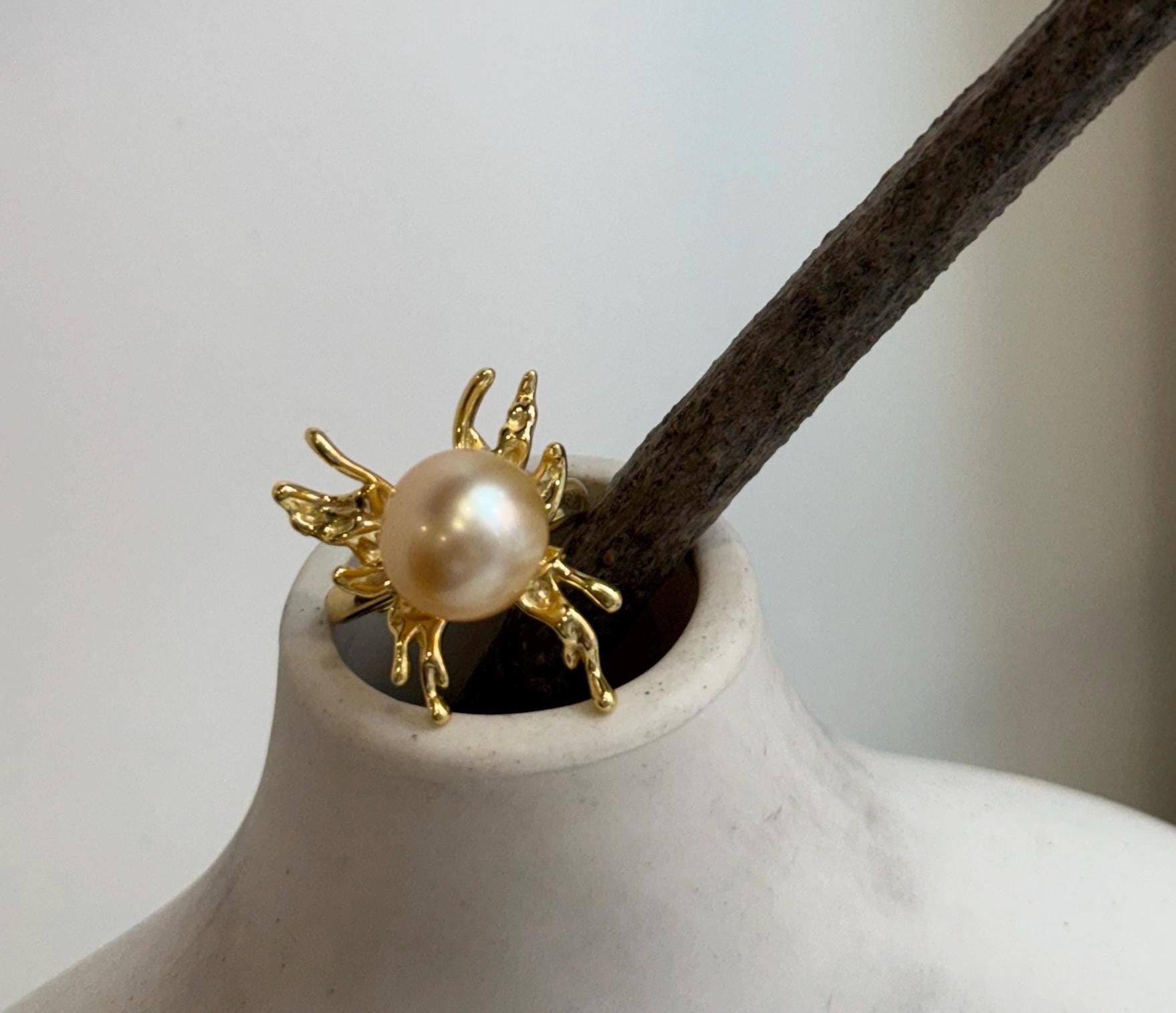 Elly’s 11.6mm South Sea deep golden pearl butterfly ring with extreme mirror luster and S925 sterling silver setting.