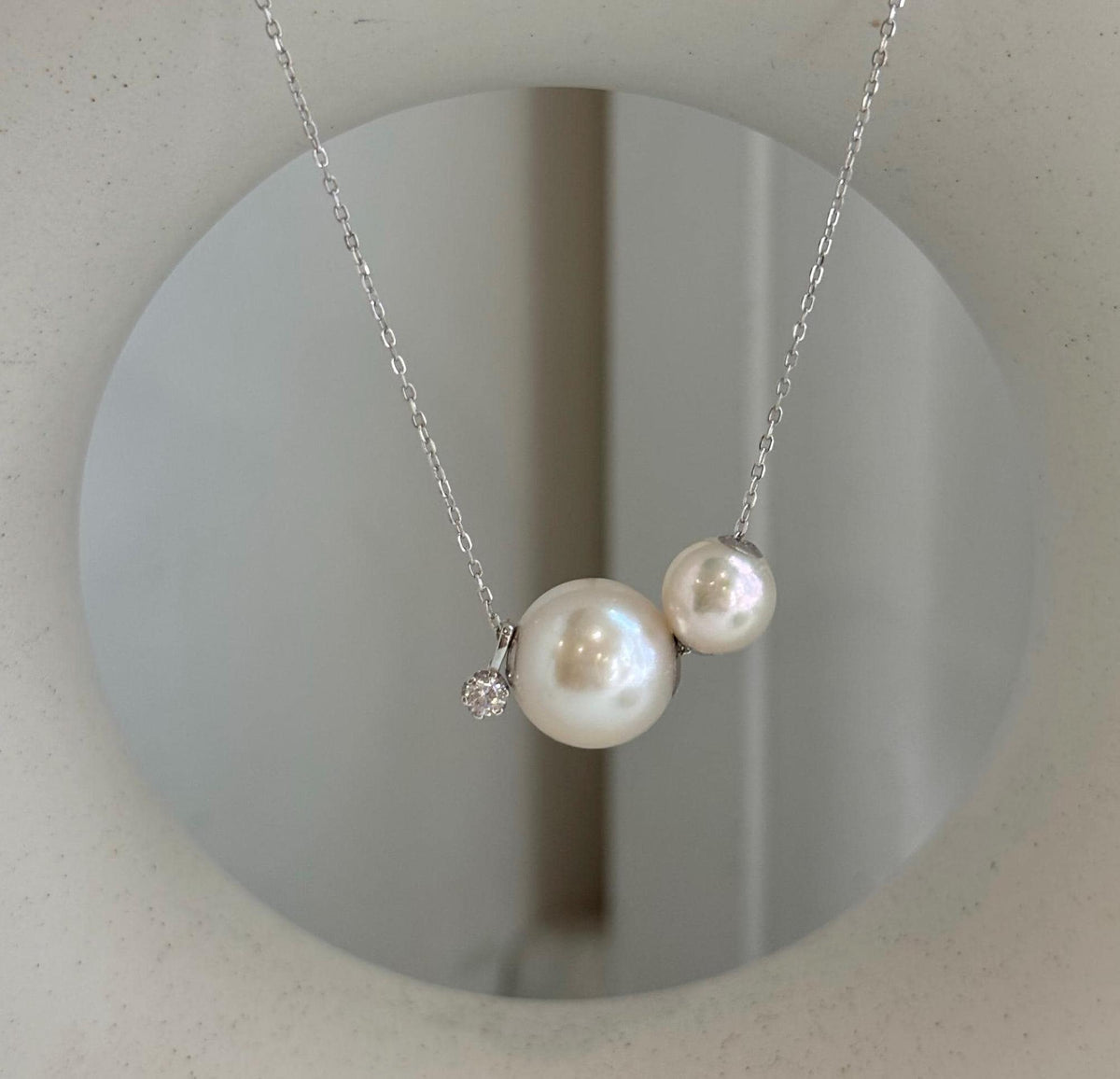 White Akoya and golden Edison double pearl floating pendant