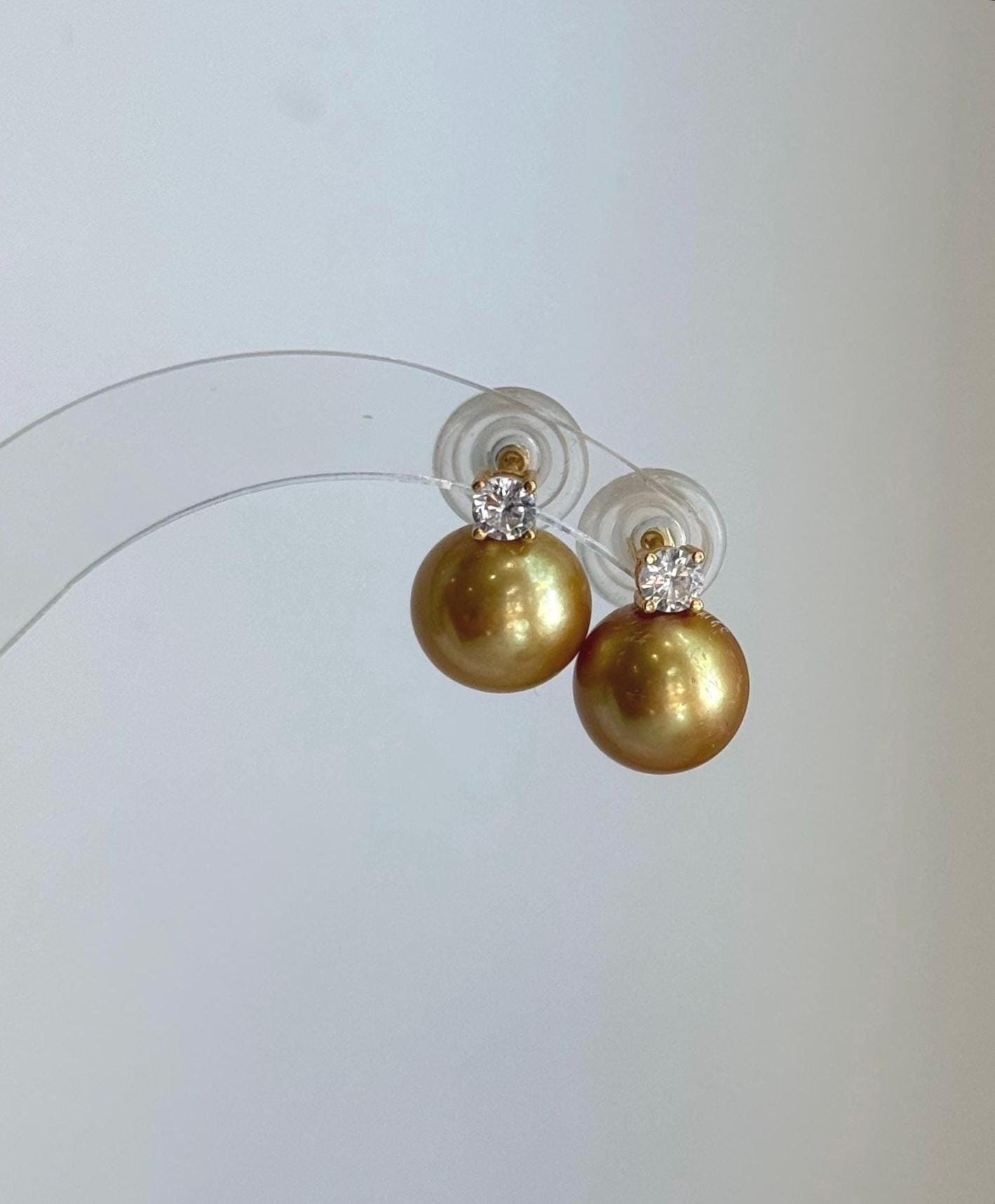 Luxury 11.3mm golden pearl stud earrings crafted with genuine freshwater pearls and S925 silver.