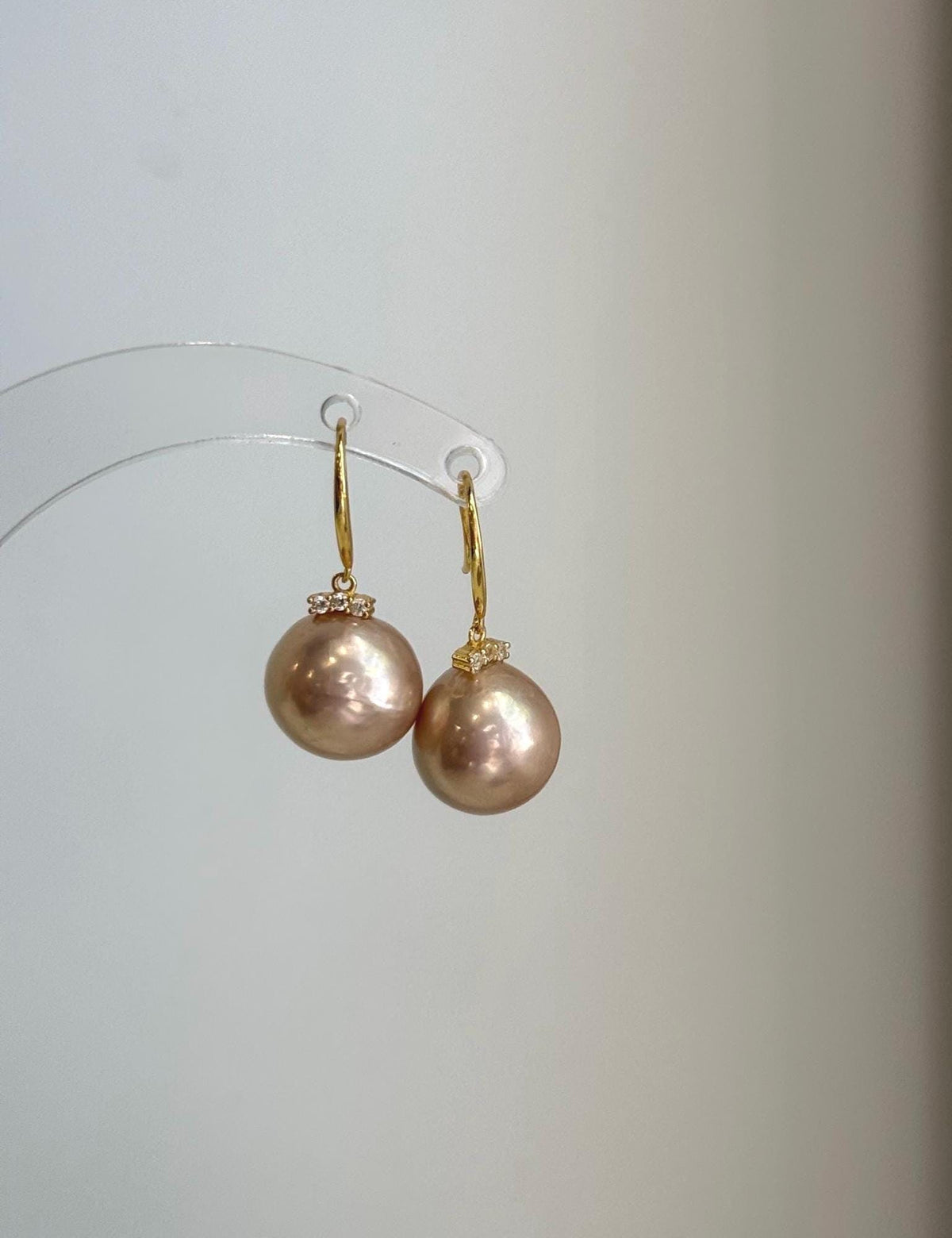 12mm rose champagne gold pearls with beautiful extreme mirror-like luster.