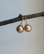 Elegant Edison freshwater pearl hook earrings measuring approximately 2.7cm high.
